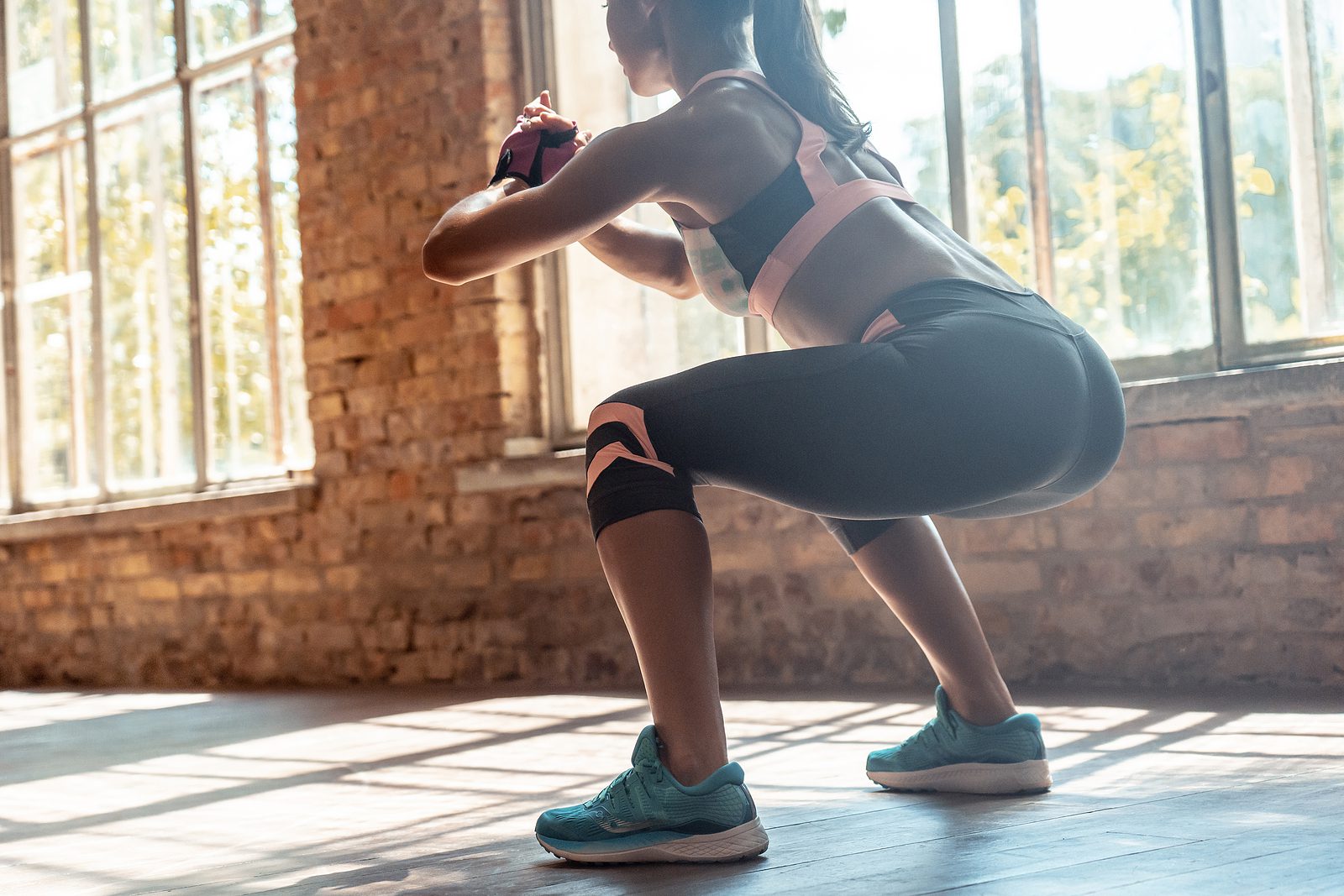 Young Fit Sporty Active Athlete Woman Wear Sportswear Crouching